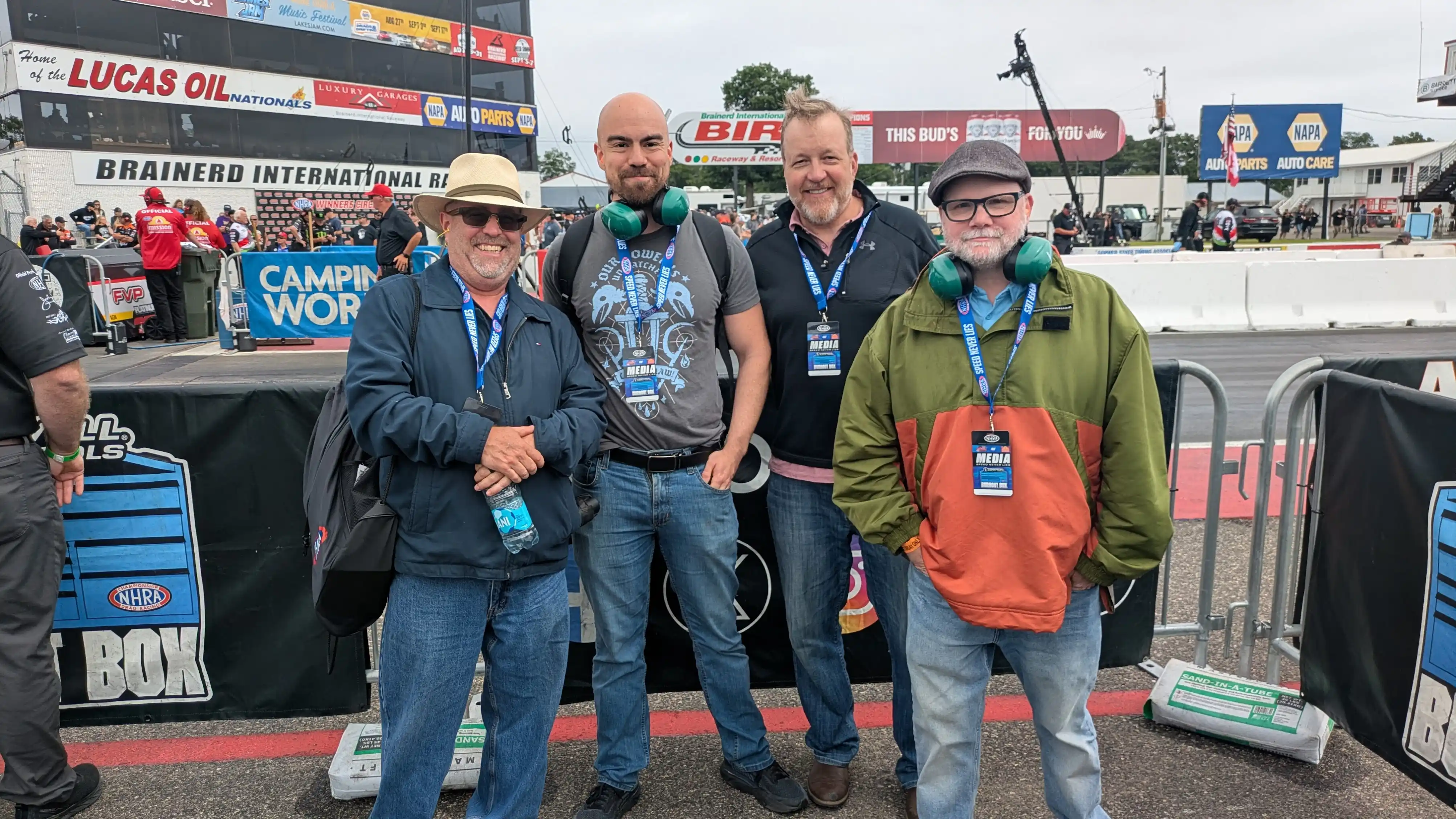 Keith Pichelman and a few members of the Concrete Software team at the National Hot Rod Association track